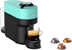 Nespresso Vertuo Pop coffee machine in lime green on kitchen counter