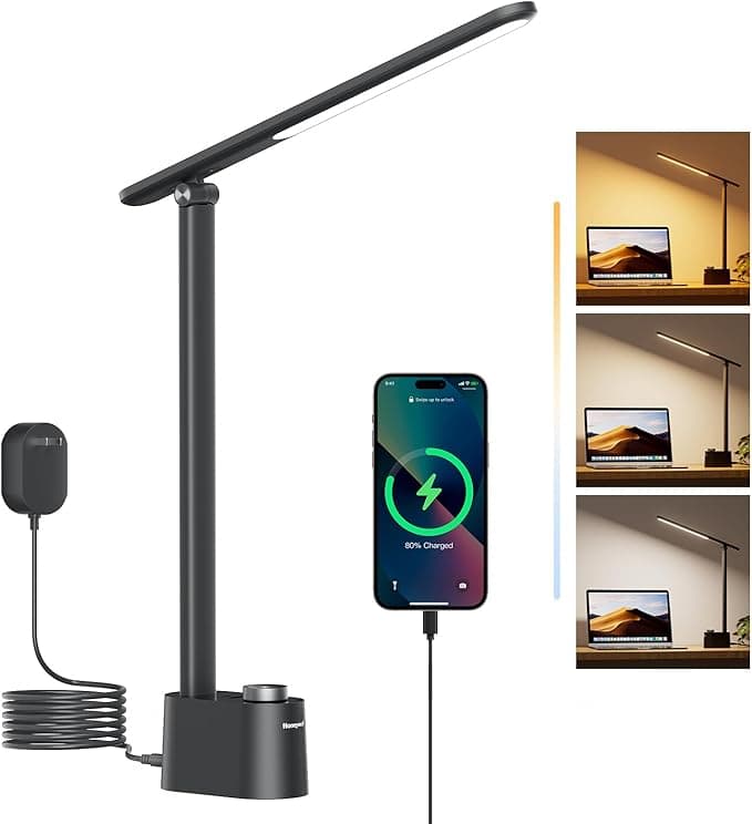 Honeywell LED desk lamp on desk with USB-C phone charging