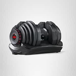 Bowflex SelectTech 1090i adjustable dumbbell in black storage cradle