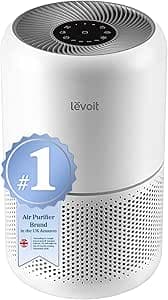 Levoit Core 300 air purifier in white on bedroom side table