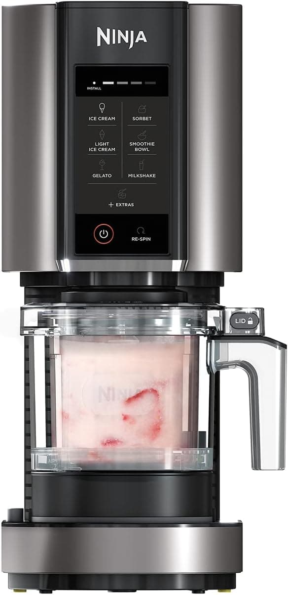 Ninja CREAMi NC300UK ice cream maker with pint container and finished ice cream